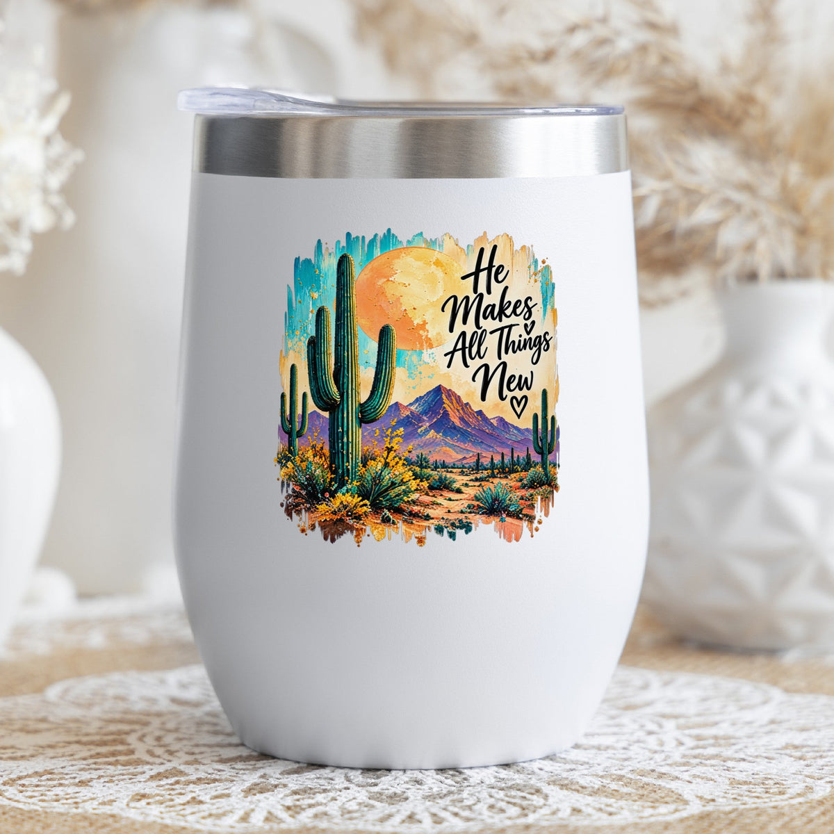 He Makes All Things New desert cactus UV DTF sticker on a stemless wine glass