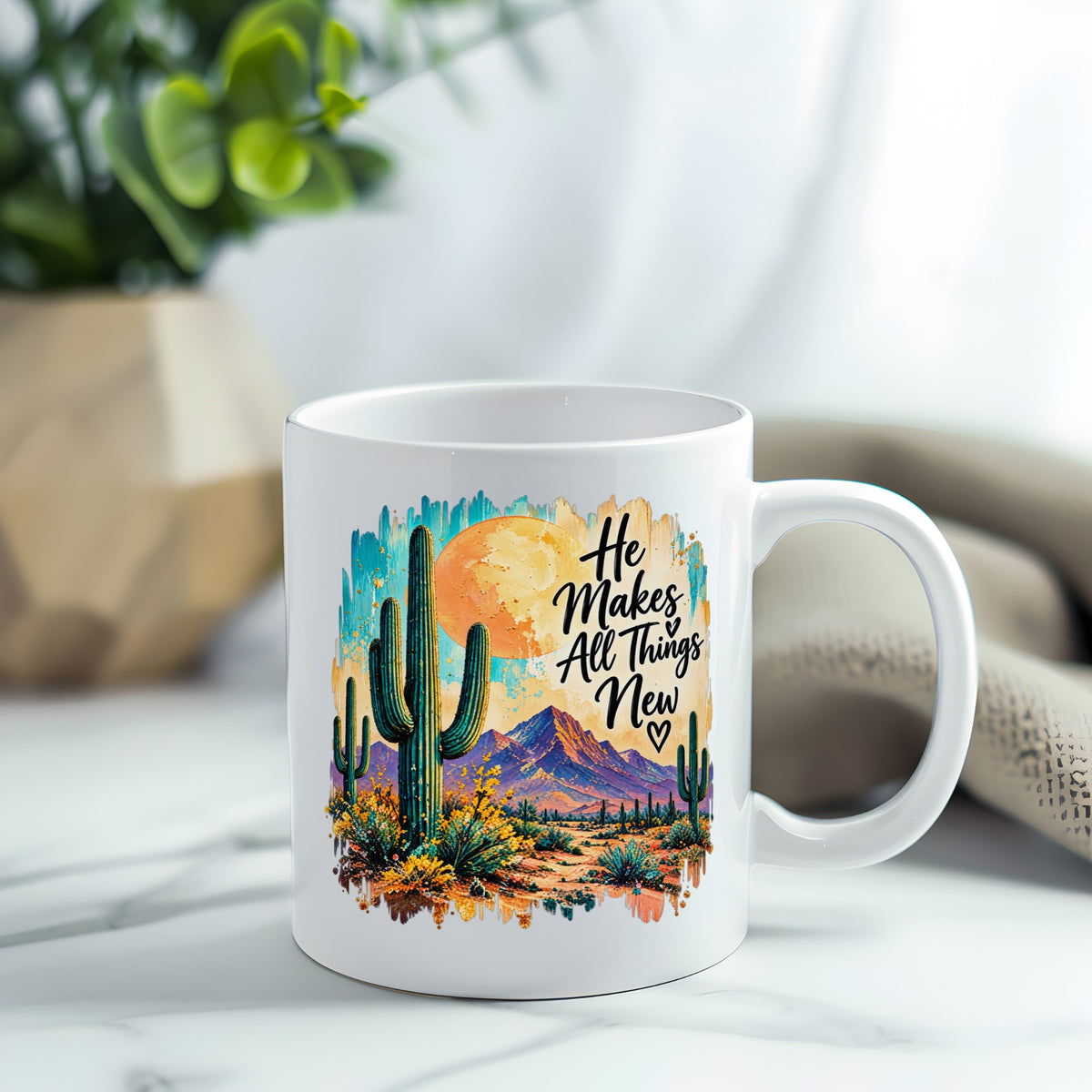 He Makes All Things New desert cactus UV DTF sticker on a white coffee cup