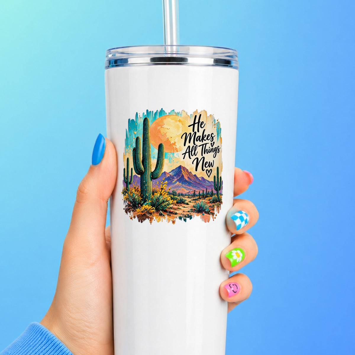 He Makes All Things New desert cactus UV DTF sticker on a pink tumbler