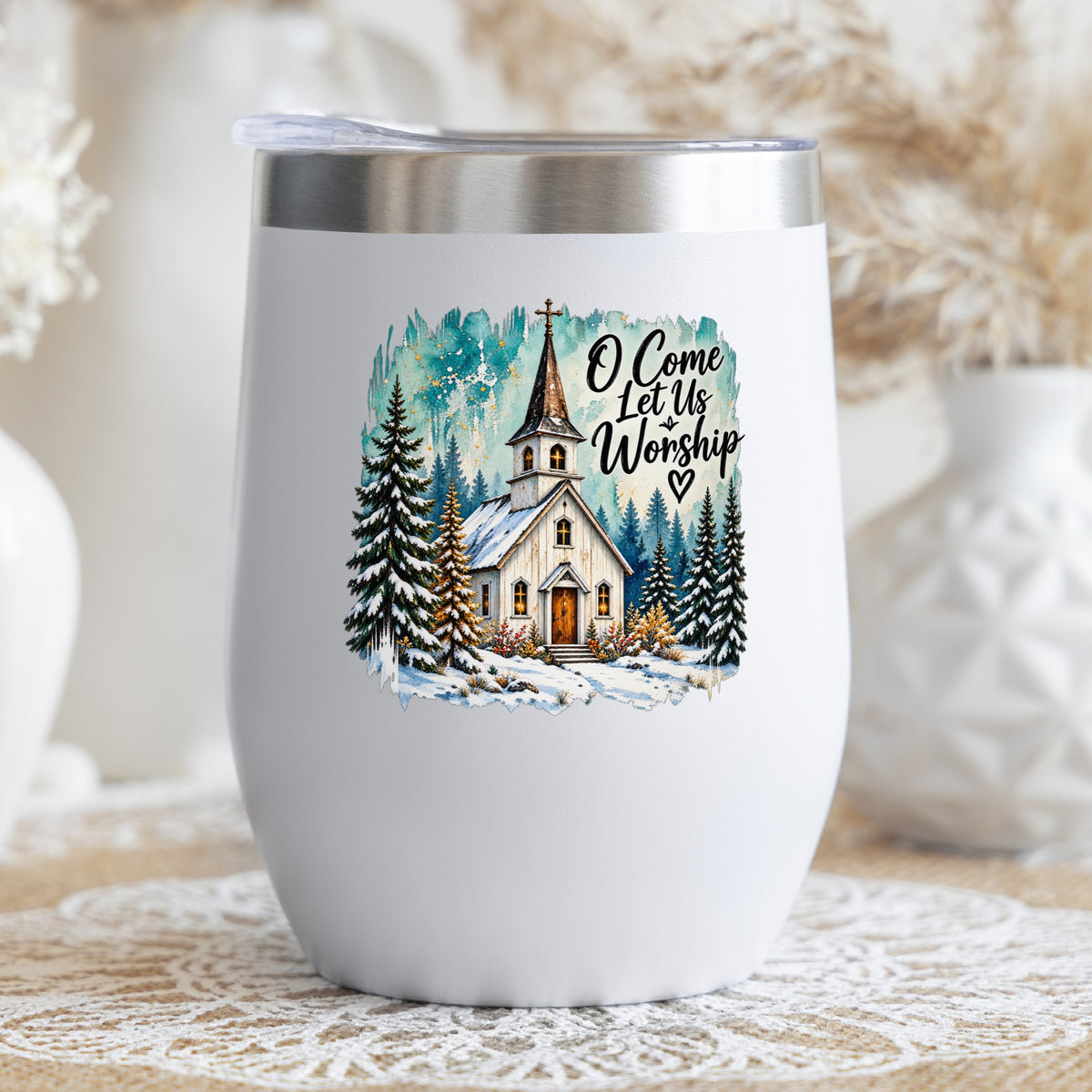 Snowy Country Church UV DTF sticker applied to a white stemless tumbler with a lid