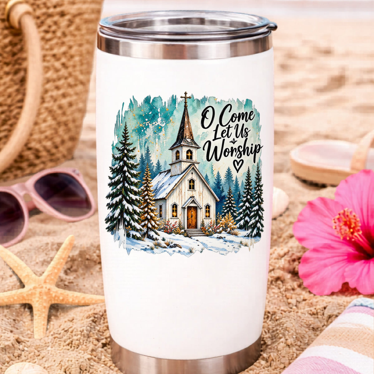 Snowy Country Church UV DTF sticker applied to a white travel tumbler on beach sand