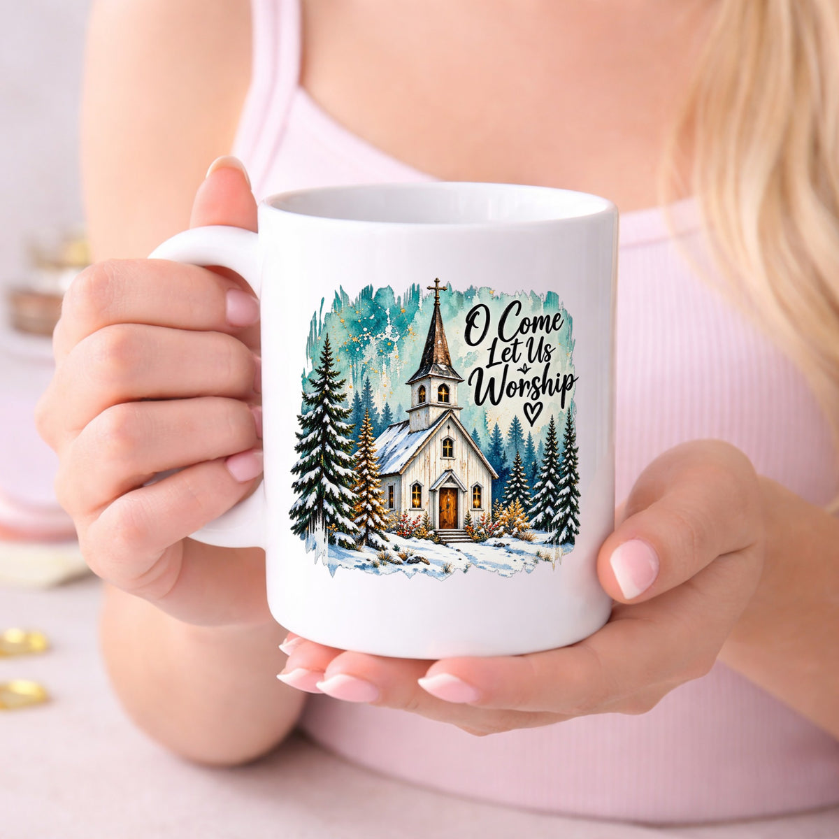 Snowy Country Church UV DTF sticker applied to a white coffee mug held in both hands