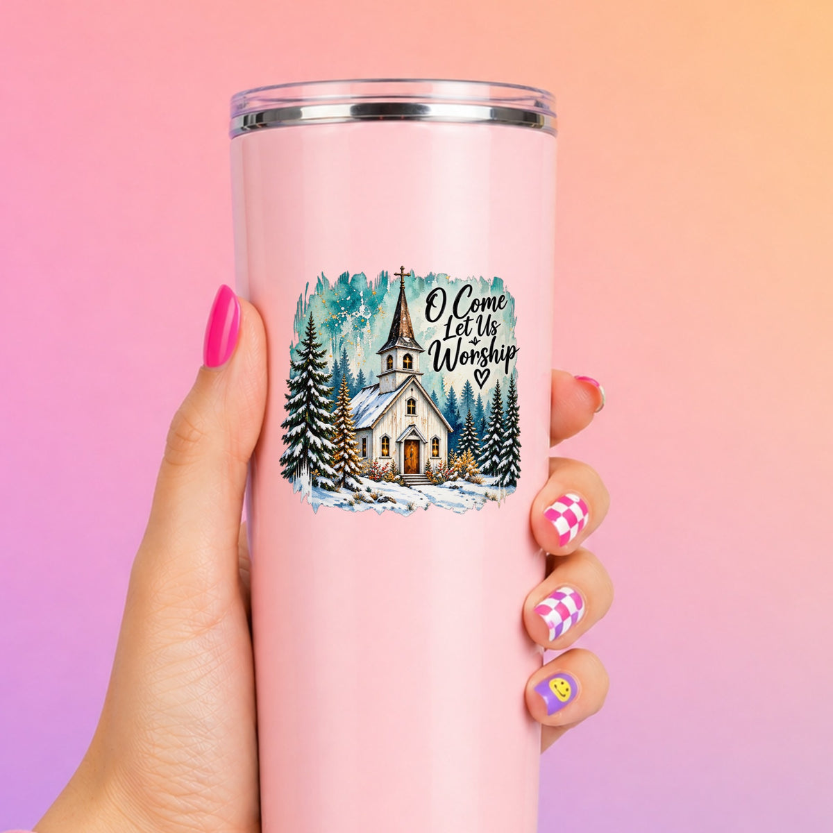 Snowy Country Church UV DTF sticker applied to a tall pink tumbler on a pink and orange background