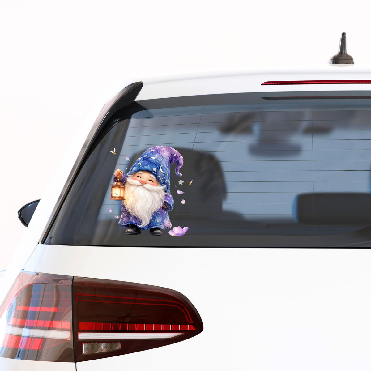Gnome Holding A Lantern UV DTF sticker applied to the rear window of a white car