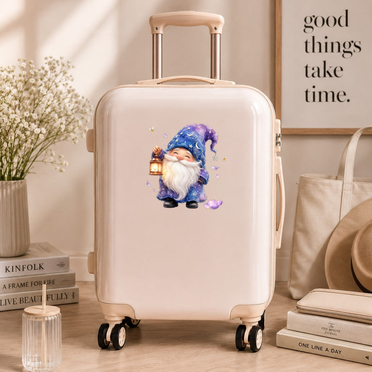 Gnome Holding A Lantern UV DTF sticker applied to a cream carry-on suitcase