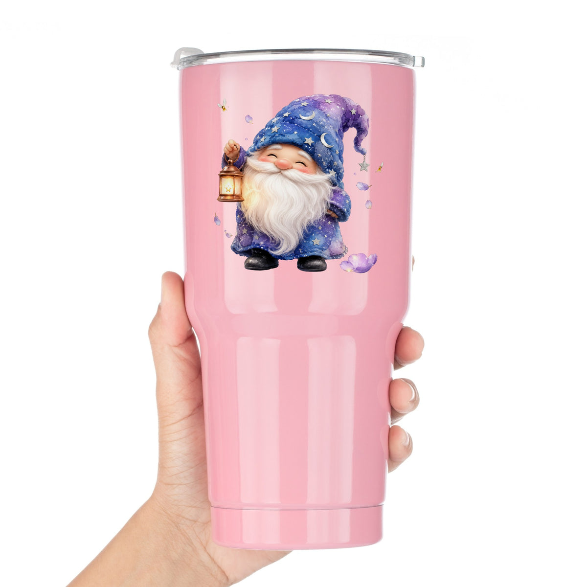 Gnome Holding A Lantern UV DTF sticker applied to a pink tumbler held against a white background