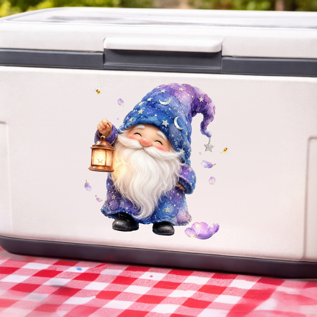 Gnome Holding A Lantern UV DTF sticker applied to a white cooler on a red gingham cloth