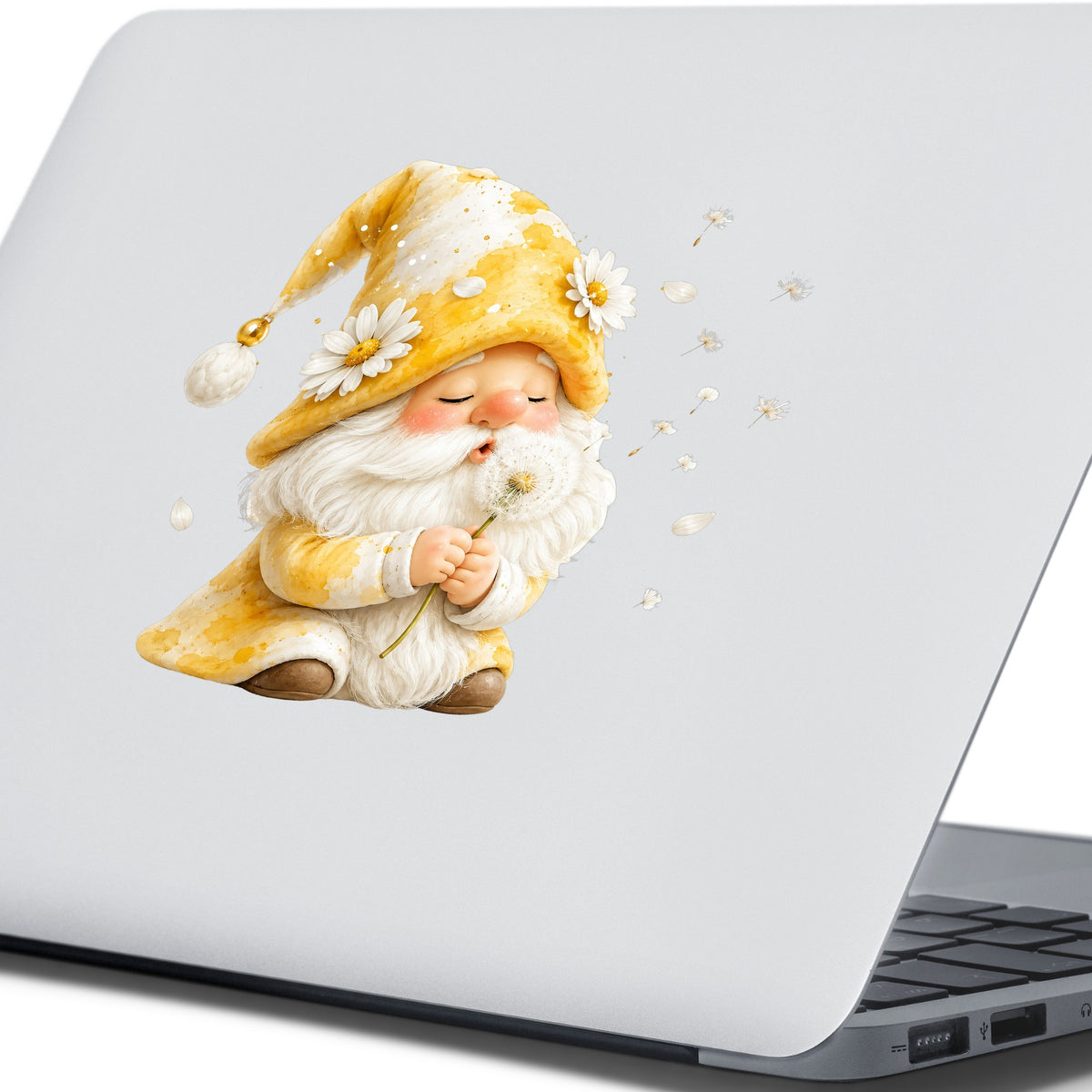 Gnome Blowing A Dandelion UV DTF sticker applied to the lid of a silver laptop