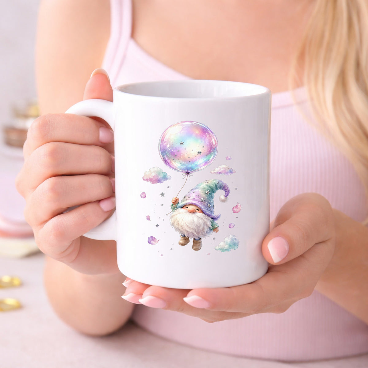 Gnome With Rainbow Bubble Balloon UV DTF sticker applied to a white coffee mug held in both hands