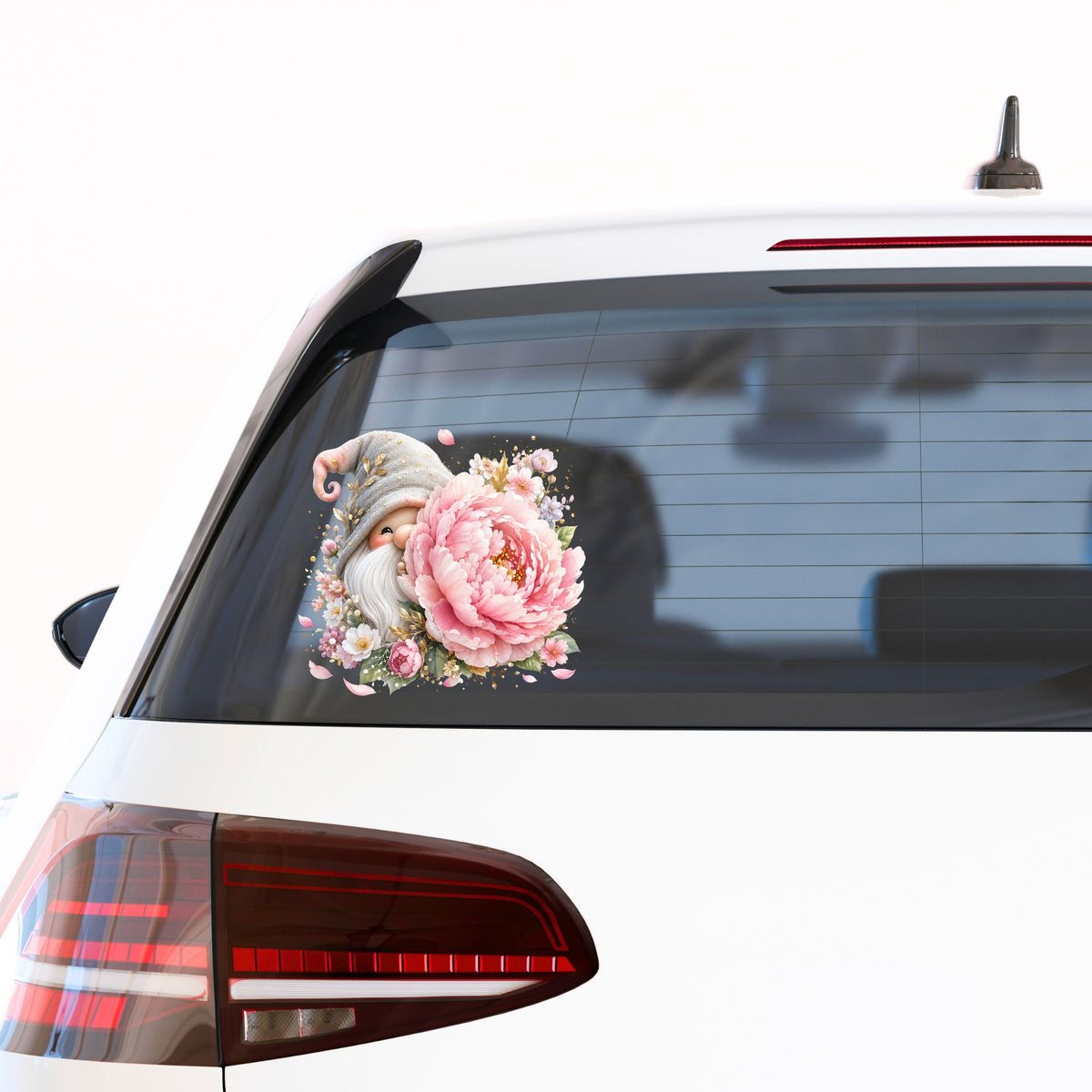 Gnome With Pink Peony UV DTF sticker applied to the rear window of a white car