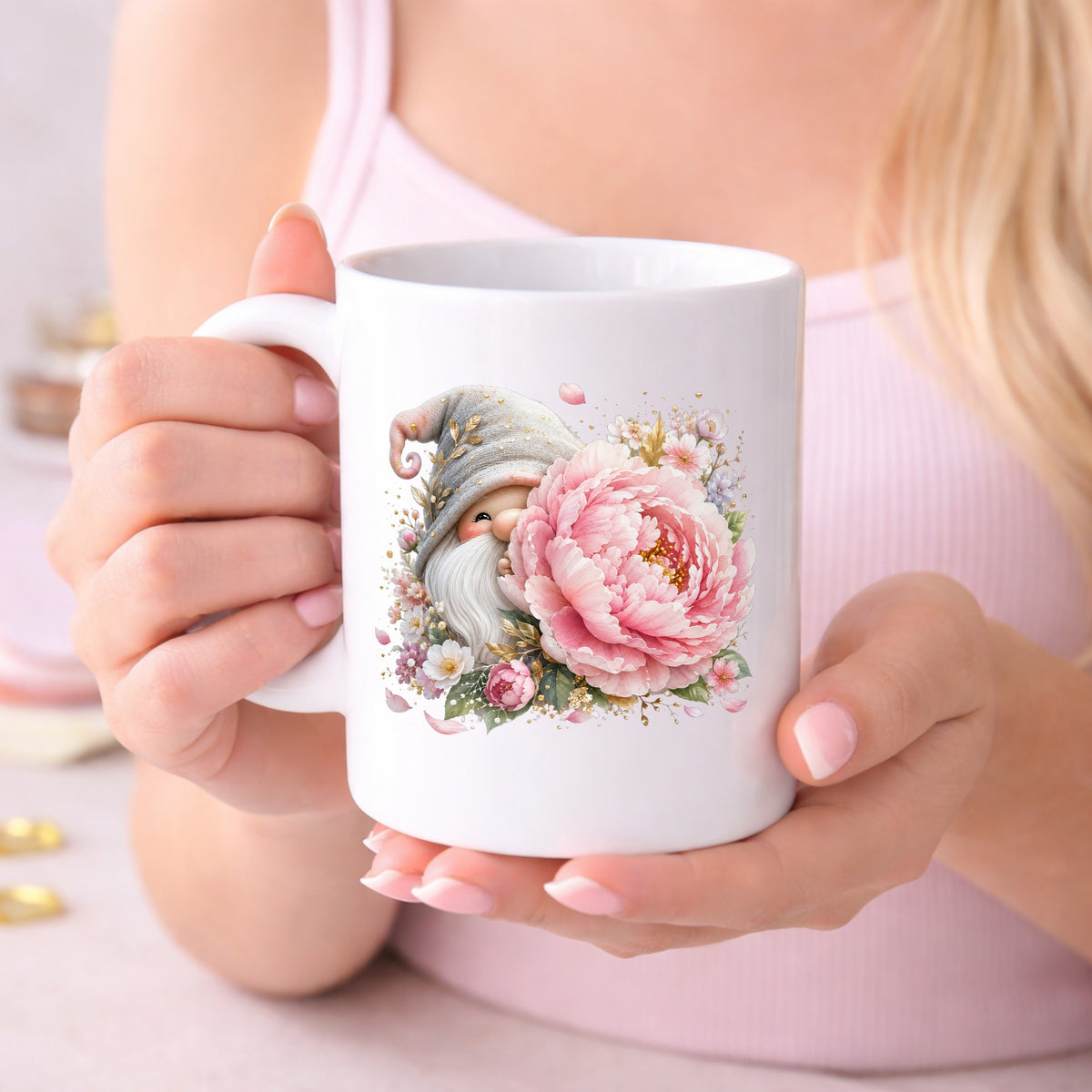Gnome With Pink Peony UV DTF sticker applied to a white coffee mug held in both hands