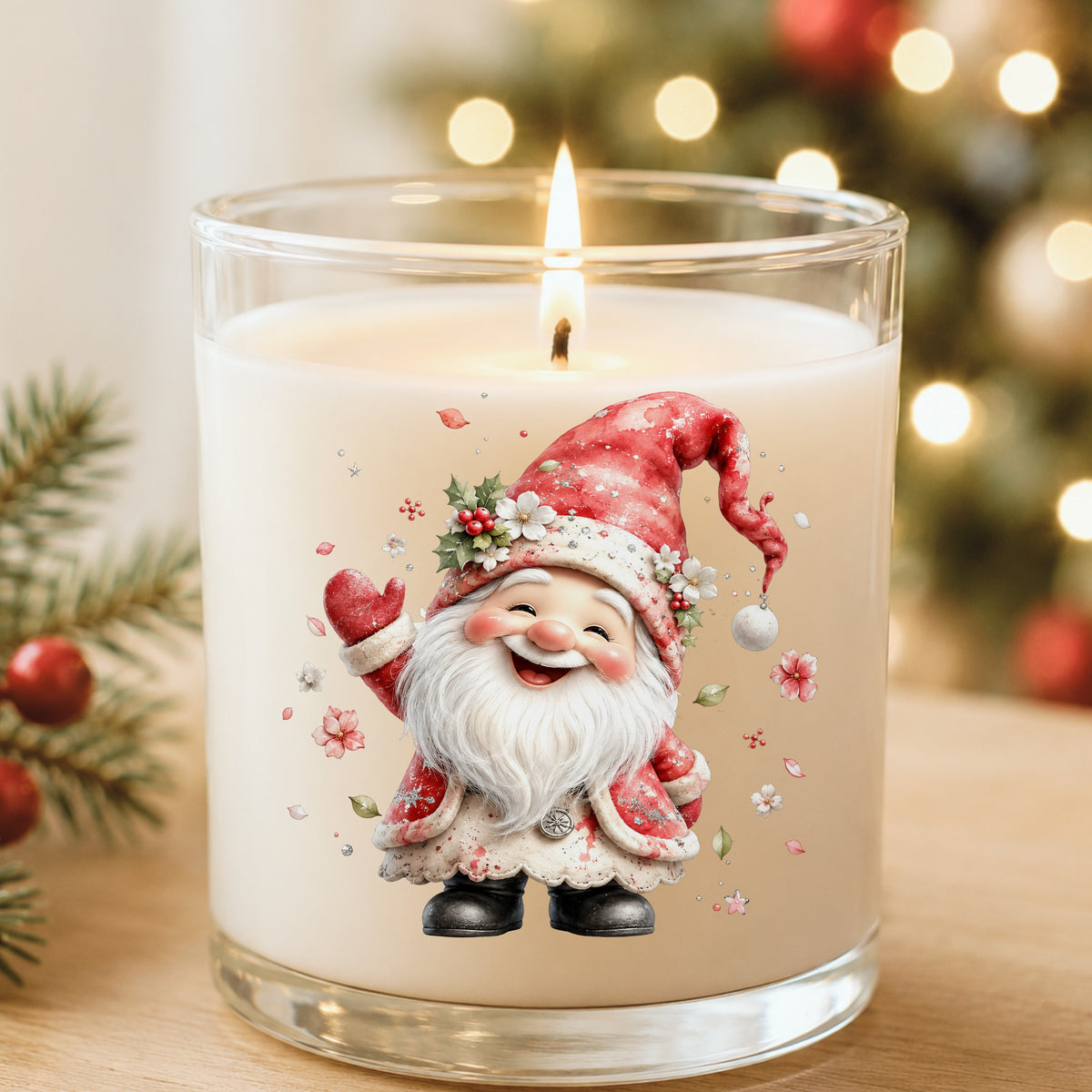 Red Christmas Gnome UV DTF sticker applied to a white candle in a glass holder near Christmas lights