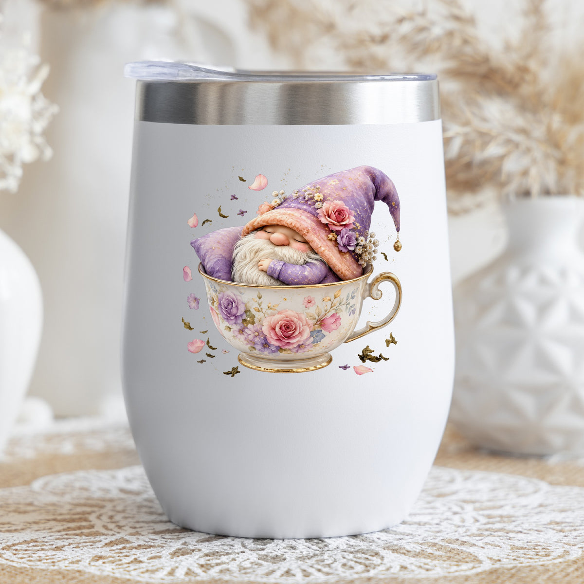 Gnome Sleeping In Teacup UV DTF sticker applied to a white stemless tumbler with a lid