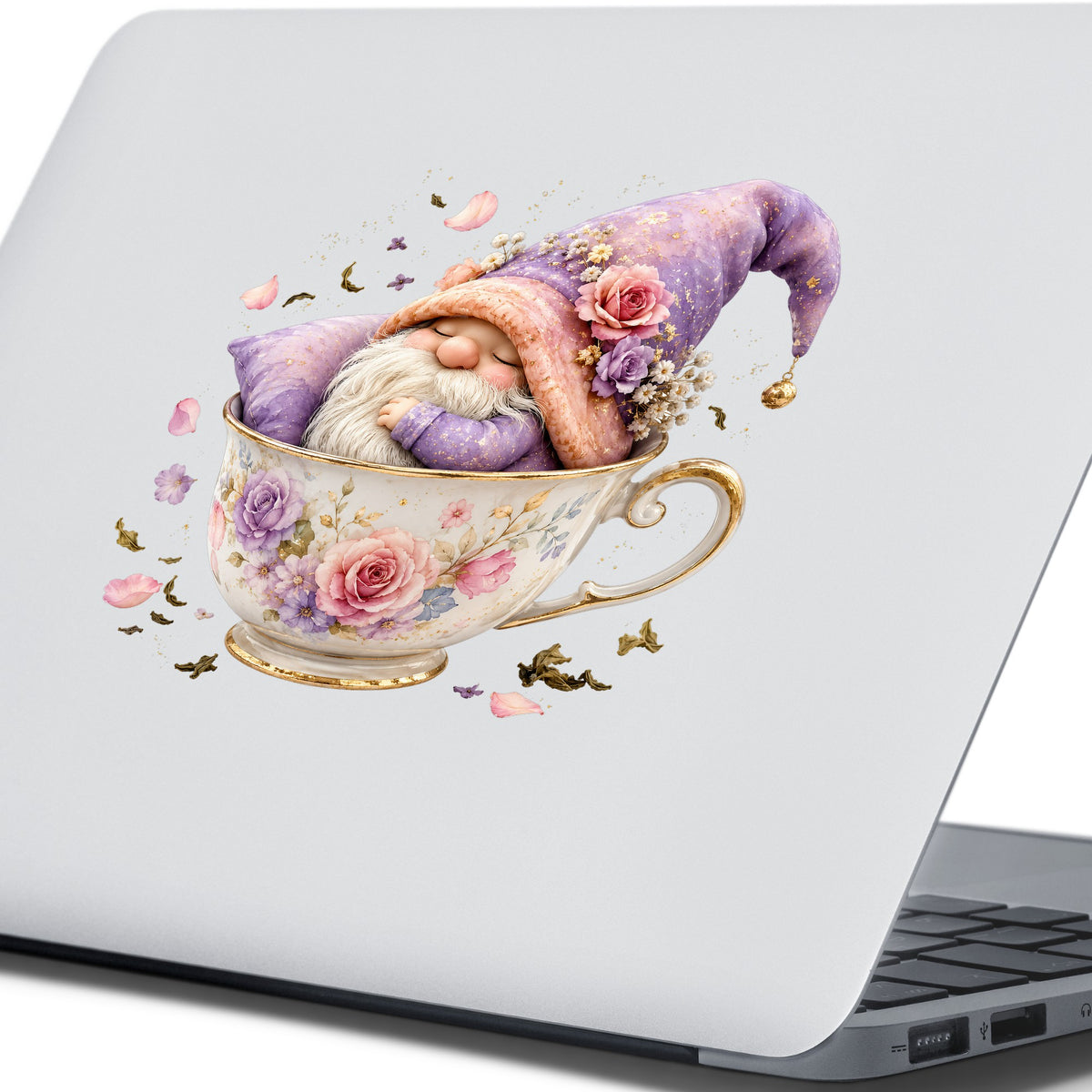 Gnome Sleeping In Teacup UV DTF sticker applied to the lid of a silver laptop