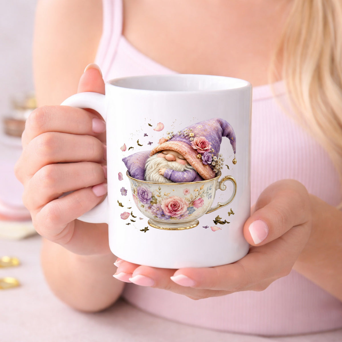 Gnome Sleeping In Teacup UV DTF sticker applied to a white coffee mug held in both hands