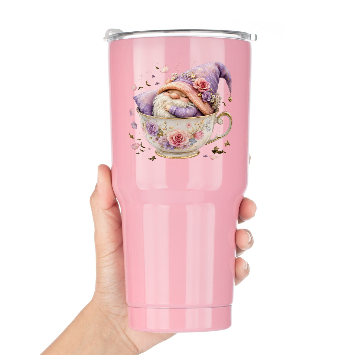 Gnome Sleeping In Teacup UV DTF sticker applied to a pink tumbler held against a white background
