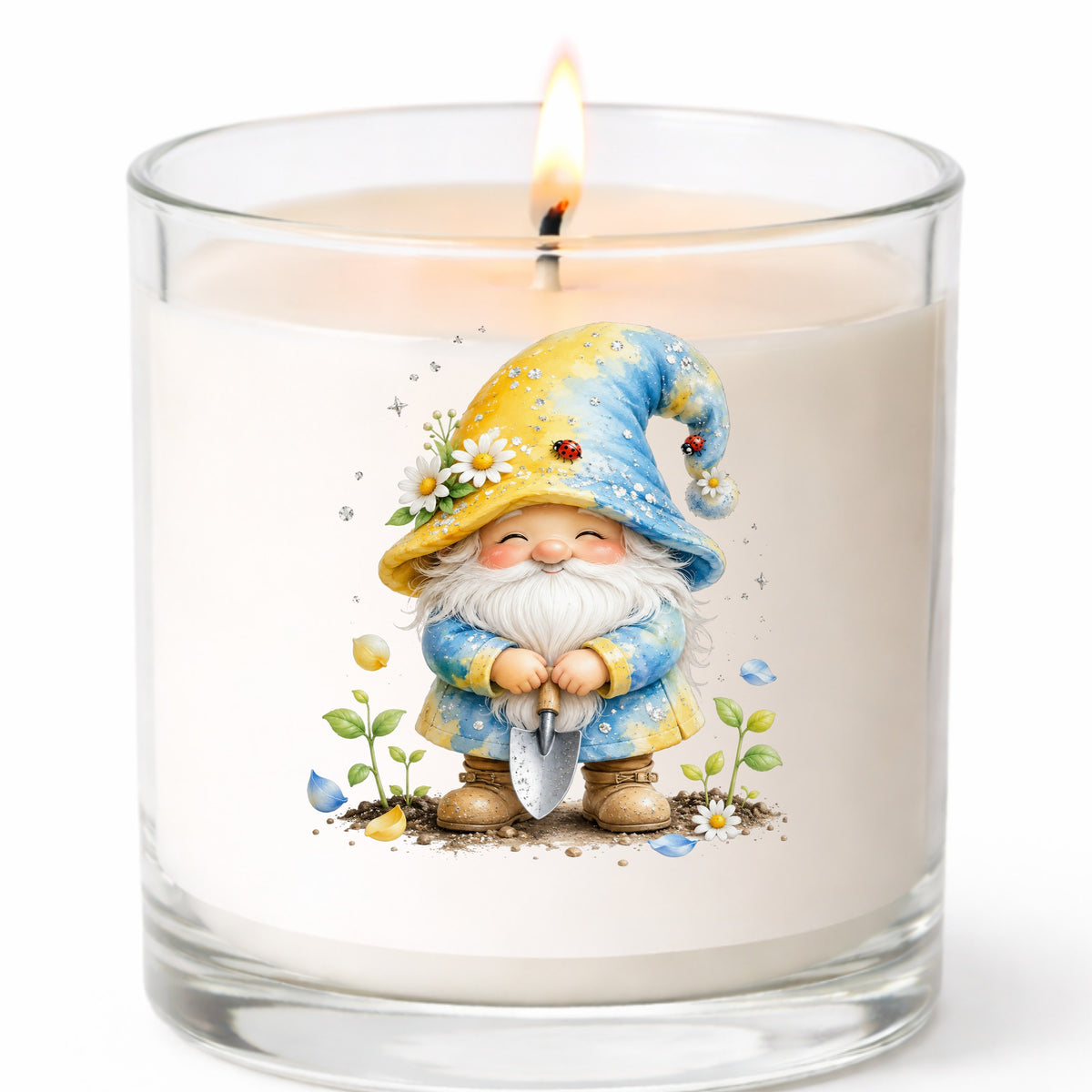 Gardening Gnome With Trowel UV DTF sticker applied to a white candle in a clear glass jar