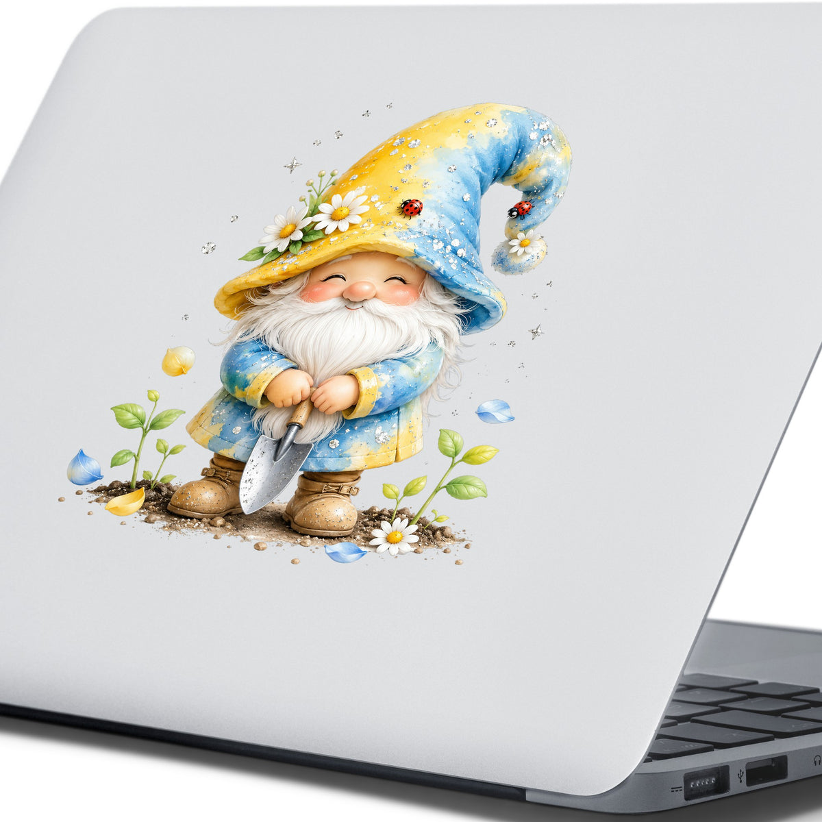 Gardening Gnome With Trowel UV DTF sticker applied to the lid of a silver laptop