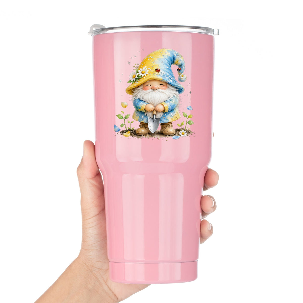 Gardening Gnome With Trowel UV DTF sticker applied to a pink tumbler held against a white background