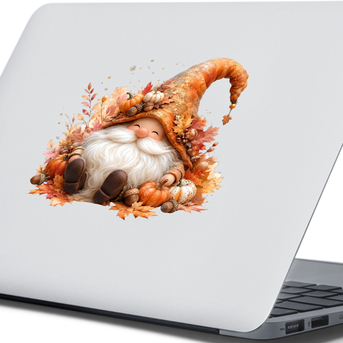 Autumn Gnome With Pumpkins UV DTF sticker applied to the lid of a silver laptop