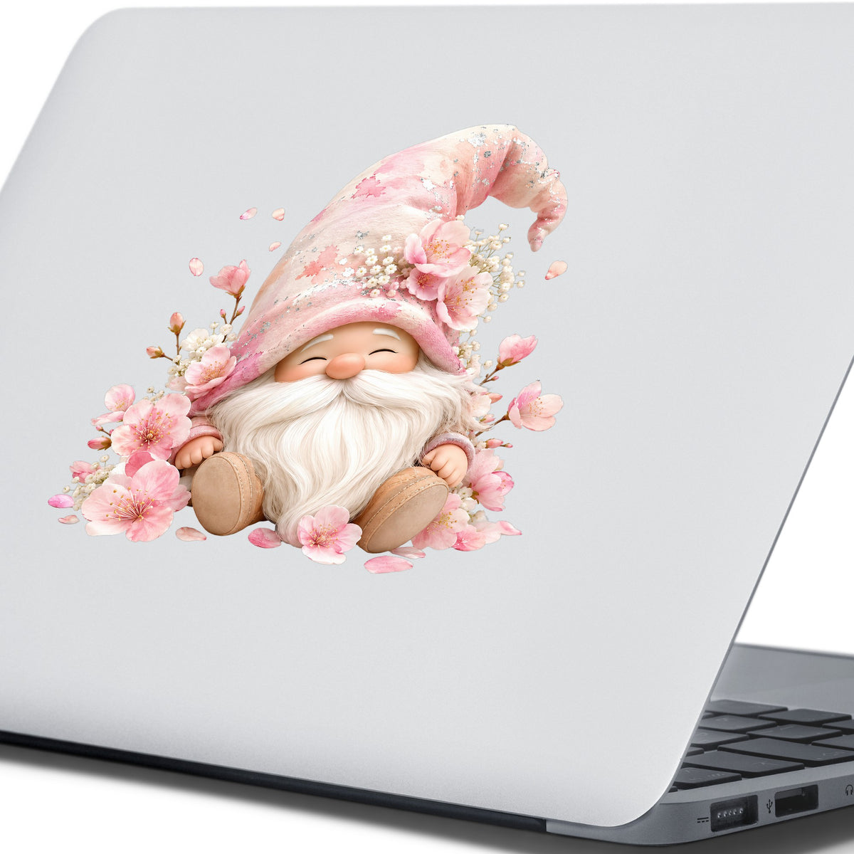 Cherry Blossom Gnome UV DTF sticker applied to the lid of a silver laptop