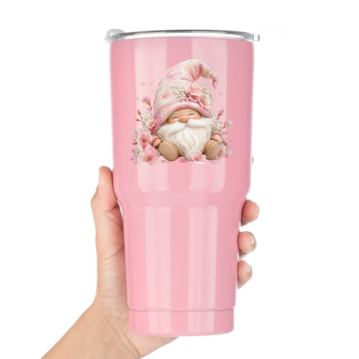 Cherry Blossom Gnome UV DTF sticker applied to a pink tumbler held against a white background