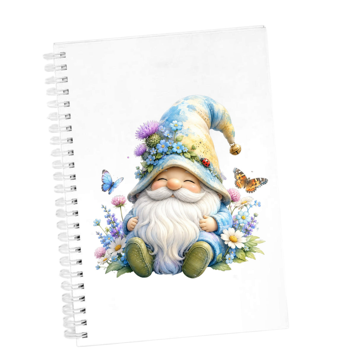 Wildflower Gnome With Butterflies UV DTF sticker applied to the cover of a white spiral journal