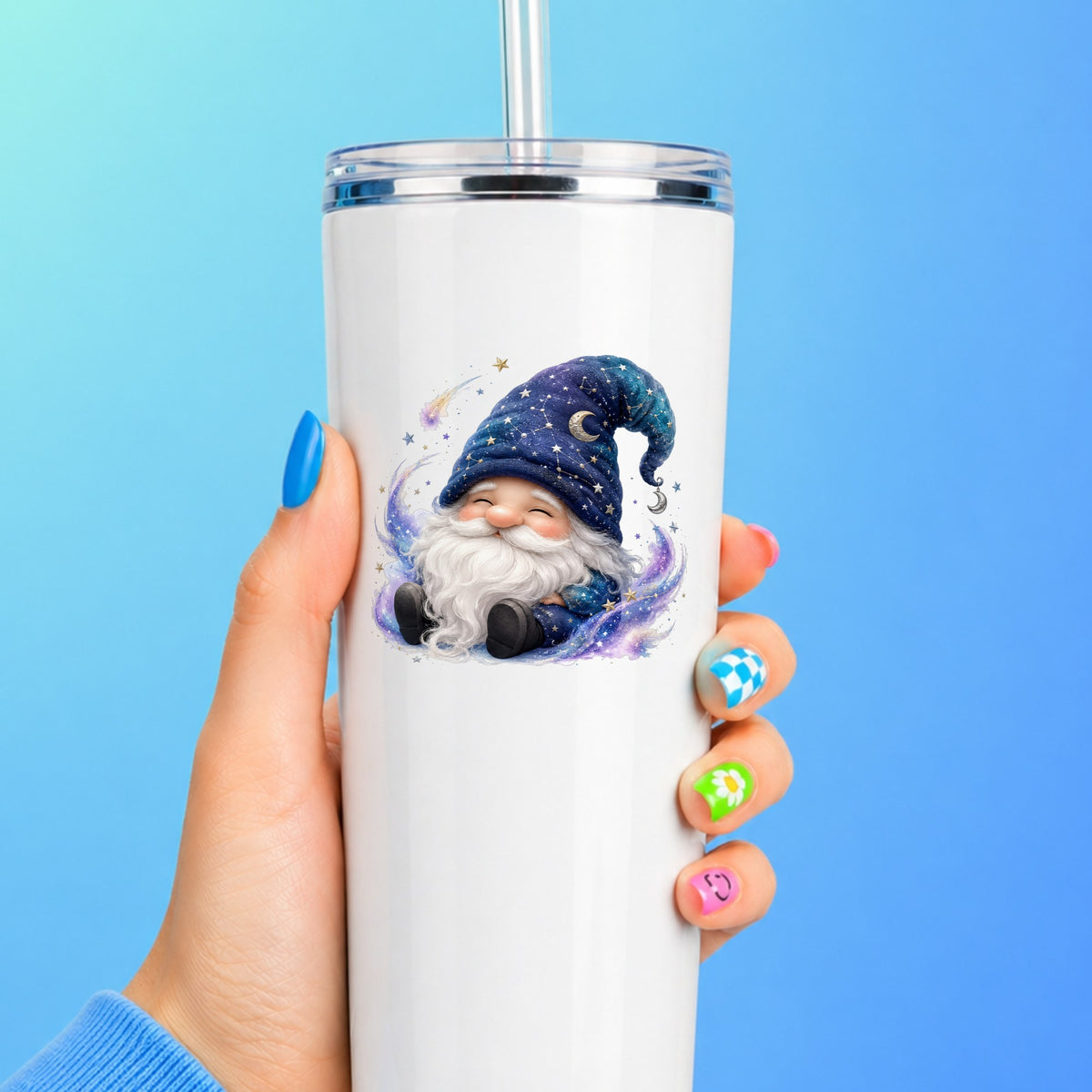Celestial Starry Night Gnome UV DTF sticker applied to a white straw tumbler on a blue background