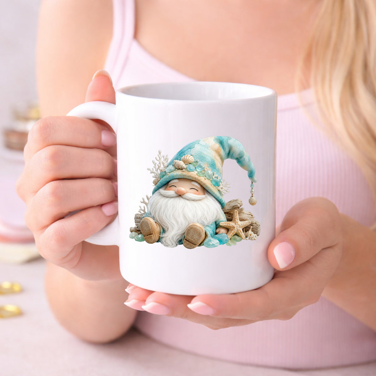 Beach Gnome With Seashells UV DTF sticker applied to a white coffee mug held in both hands