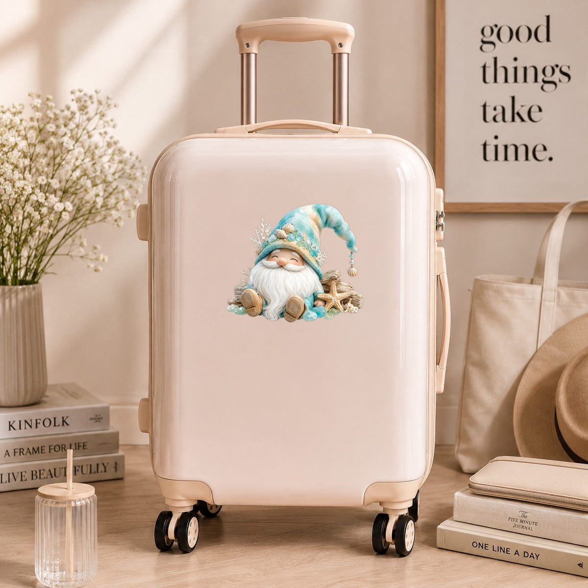 Beach Gnome With Seashells UV DTF sticker applied to a cream carry-on suitcase