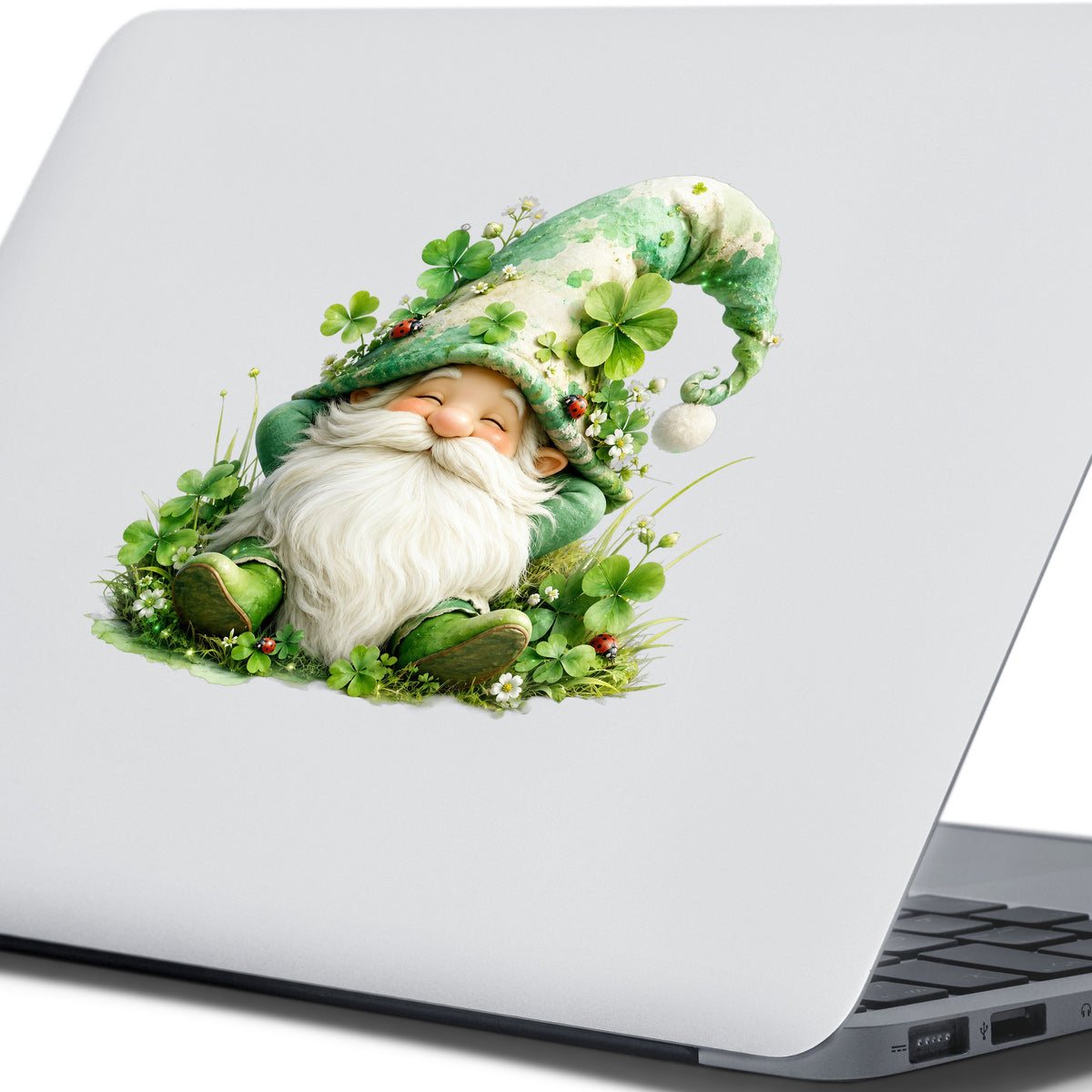 Shamrock Clover Gnome UV DTF sticker applied to the lid of a silver laptop
