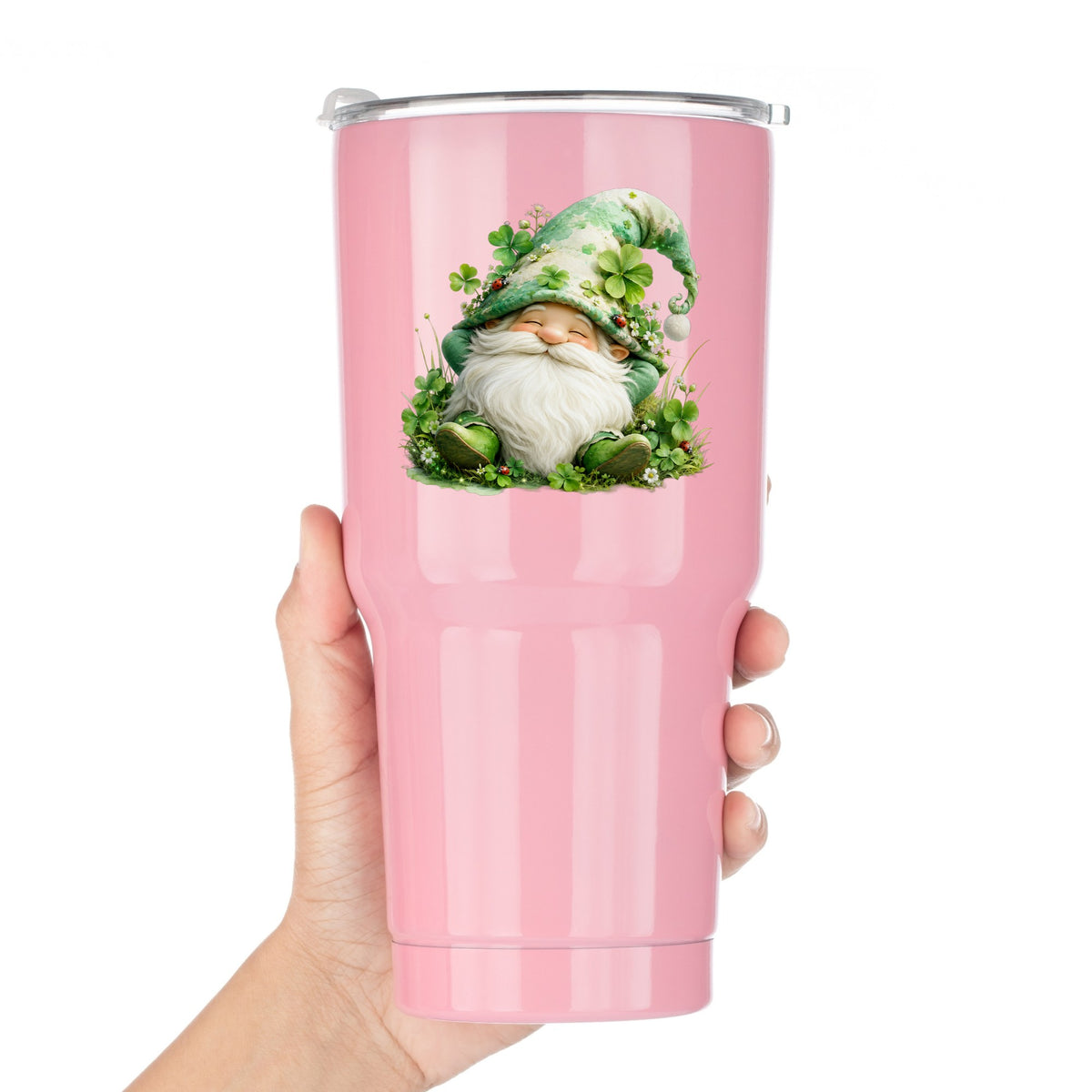 Shamrock Clover Gnome UV DTF sticker applied to a pink tumbler held against a white background