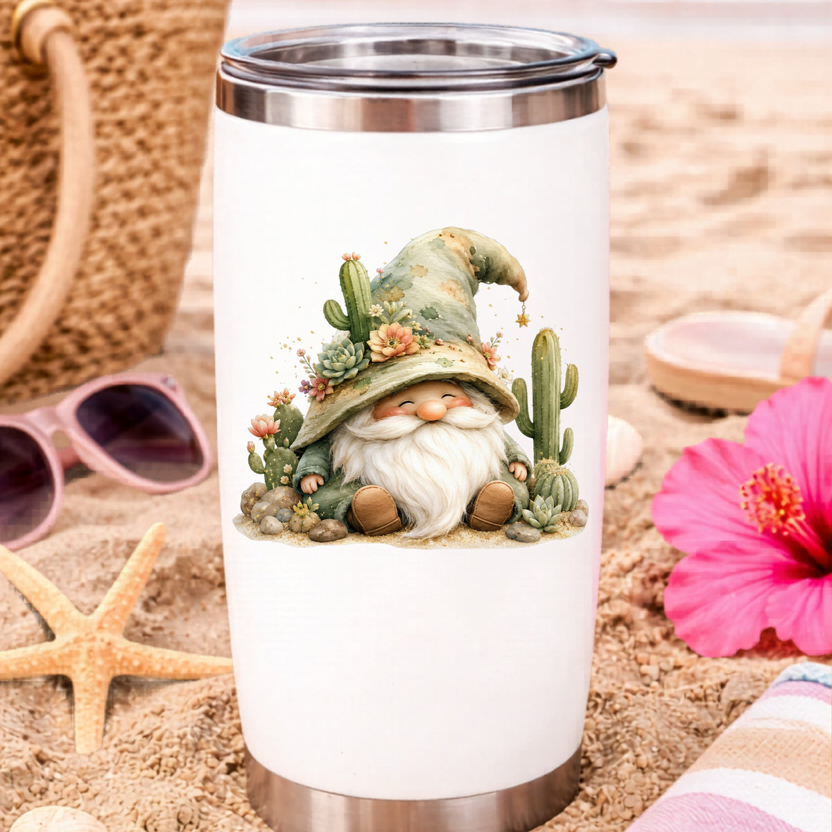 Cactus Succulent Gnome UV DTF sticker applied to a white travel tumbler on beach sand