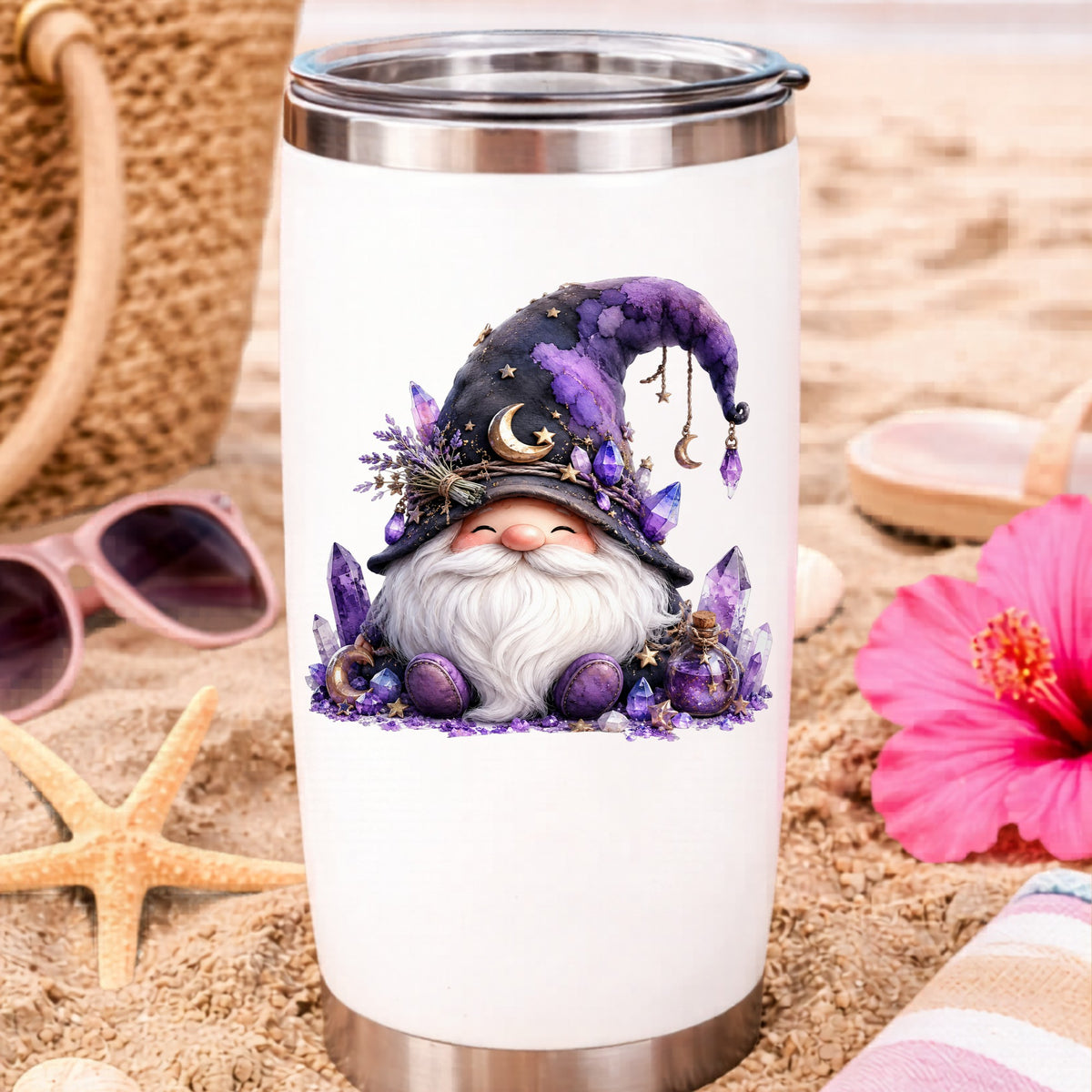 Amethyst Crystal Gnome UV DTF sticker applied to a white travel tumbler on beach sand