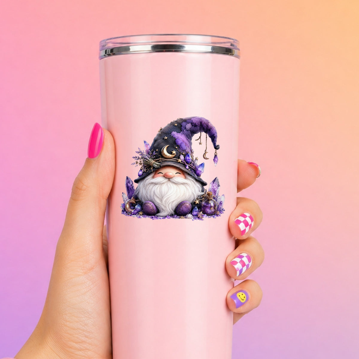 Amethyst Crystal Gnome UV DTF sticker applied to a tall pink tumbler on a pink and orange background