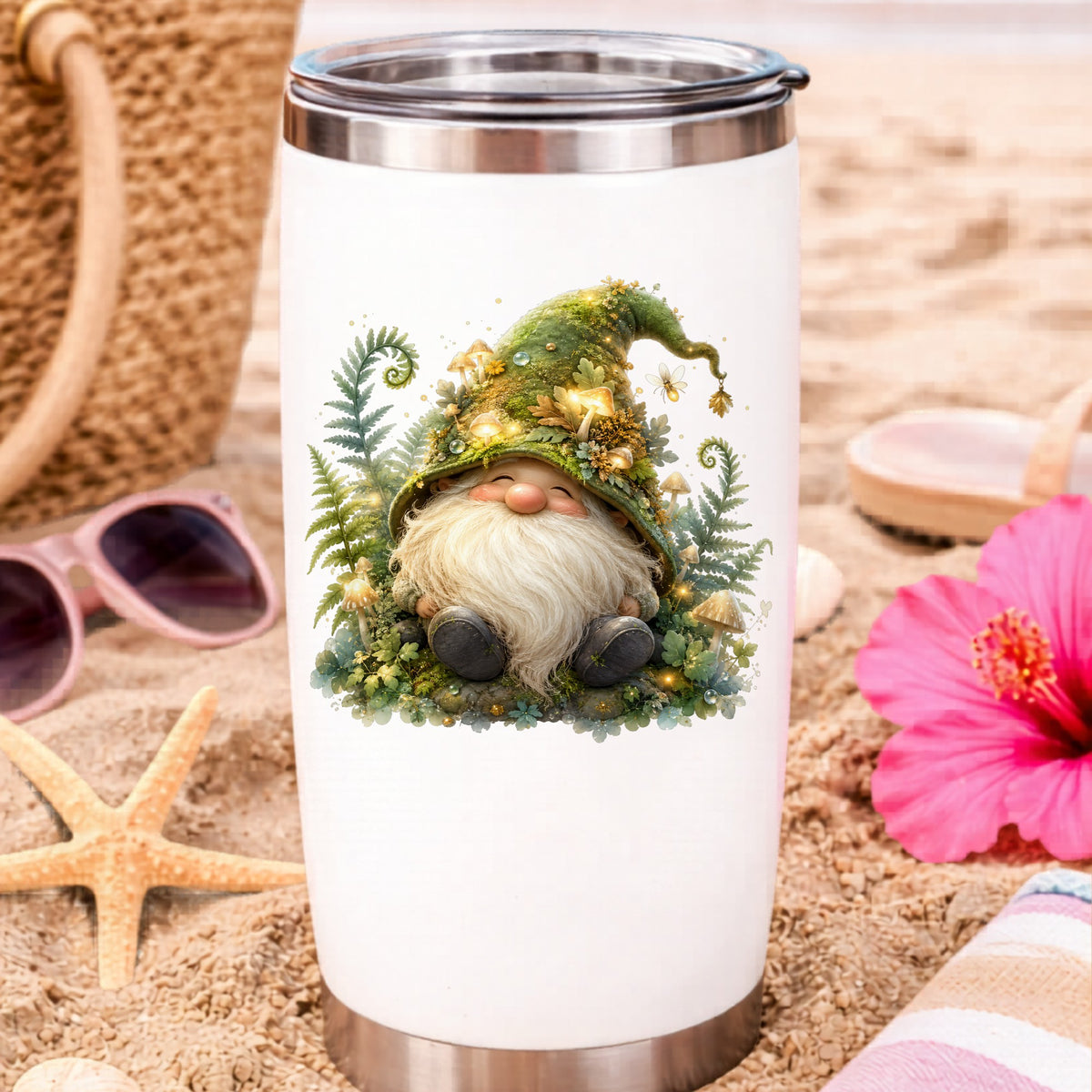 Mossy Forest Gnome UV DTF sticker applied to a white travel tumbler on beach sand