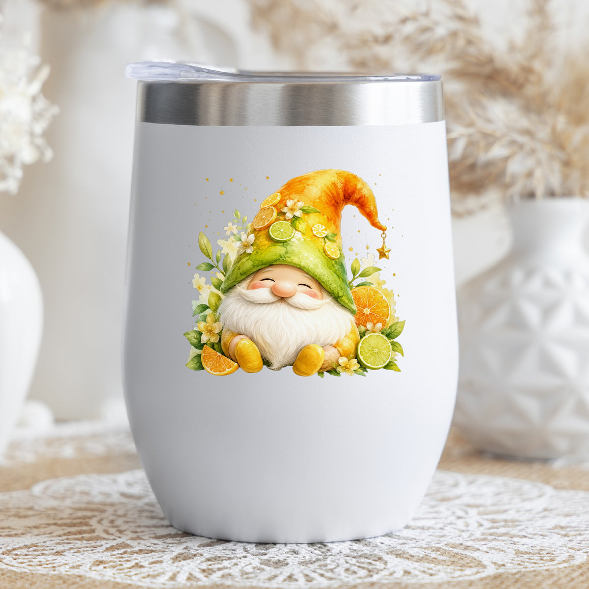 Citrus Gnome With Orange Slices UV DTF sticker applied to a white stemless tumbler with a lid