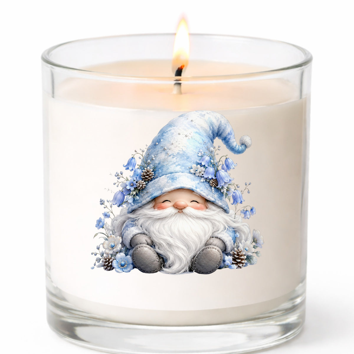 Winter Gnome With Pinecones UV DTF sticker applied to a white candle in a clear glass jar
