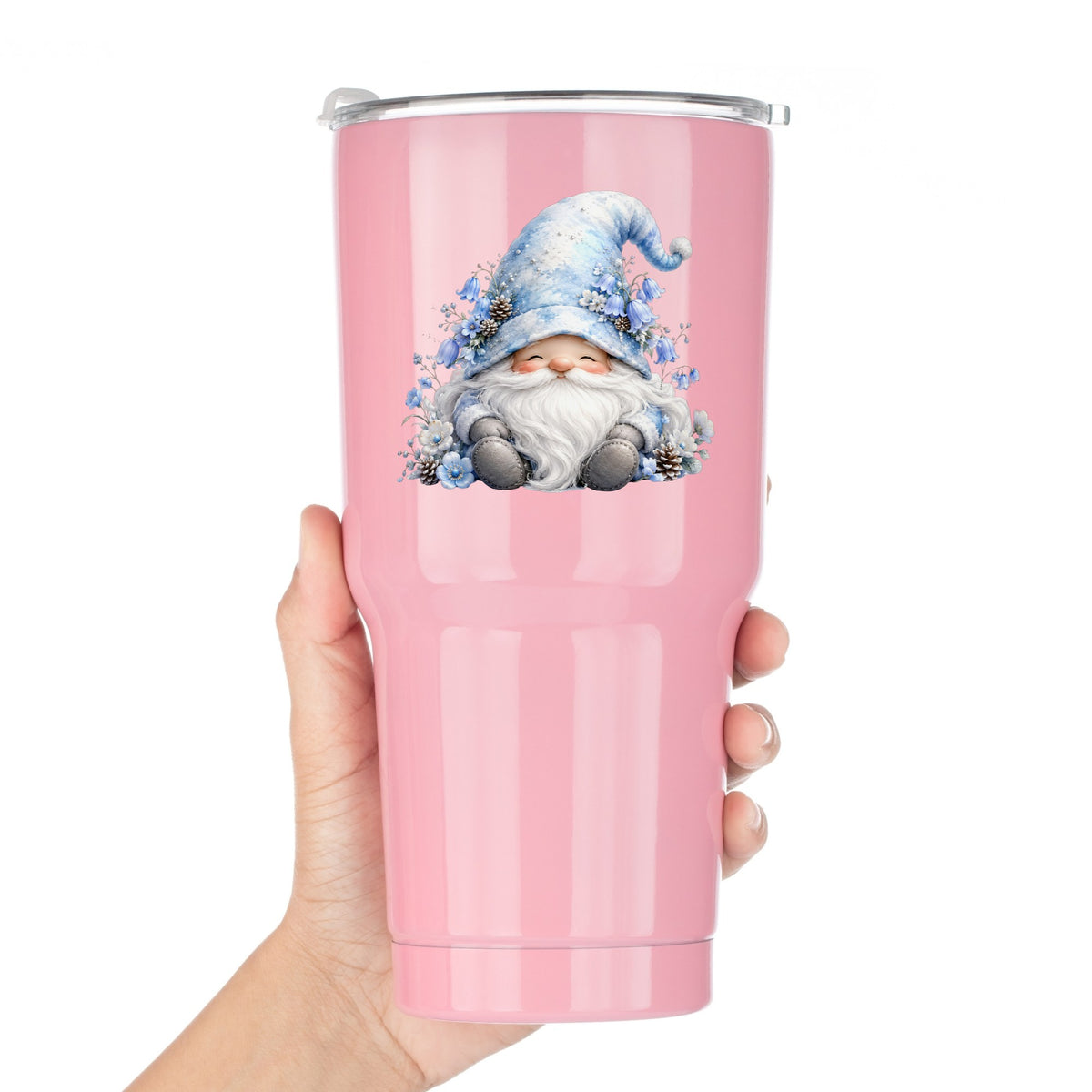 Winter Gnome With Pinecones UV DTF sticker applied to a pink tumbler held against a white background