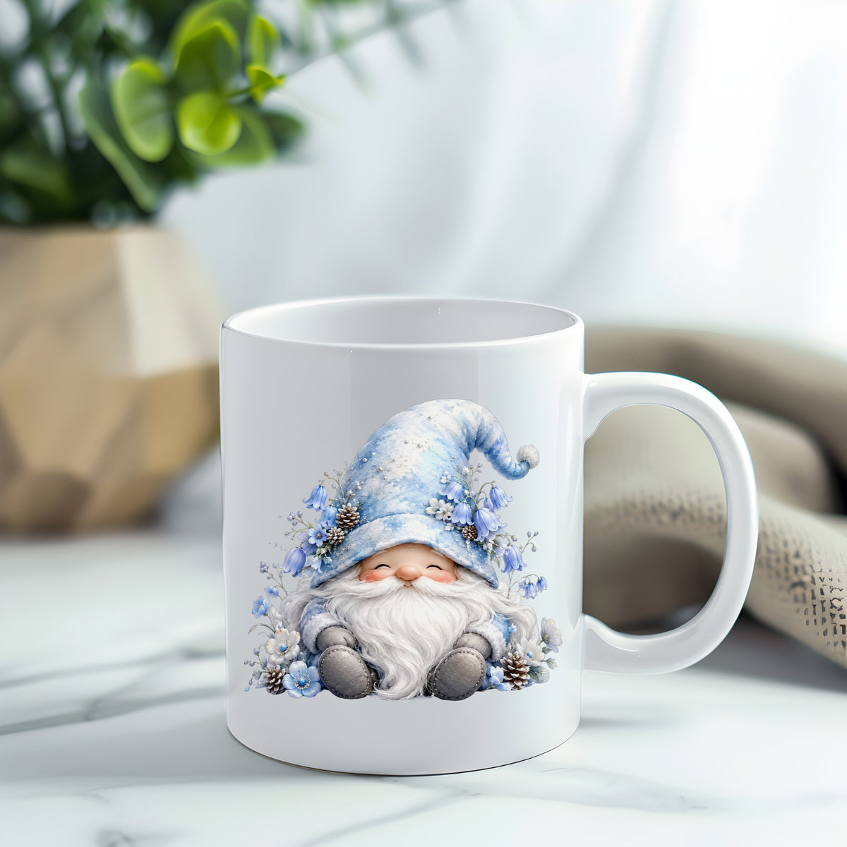Winter Gnome With Pinecones UV DTF sticker applied to a white coffee mug