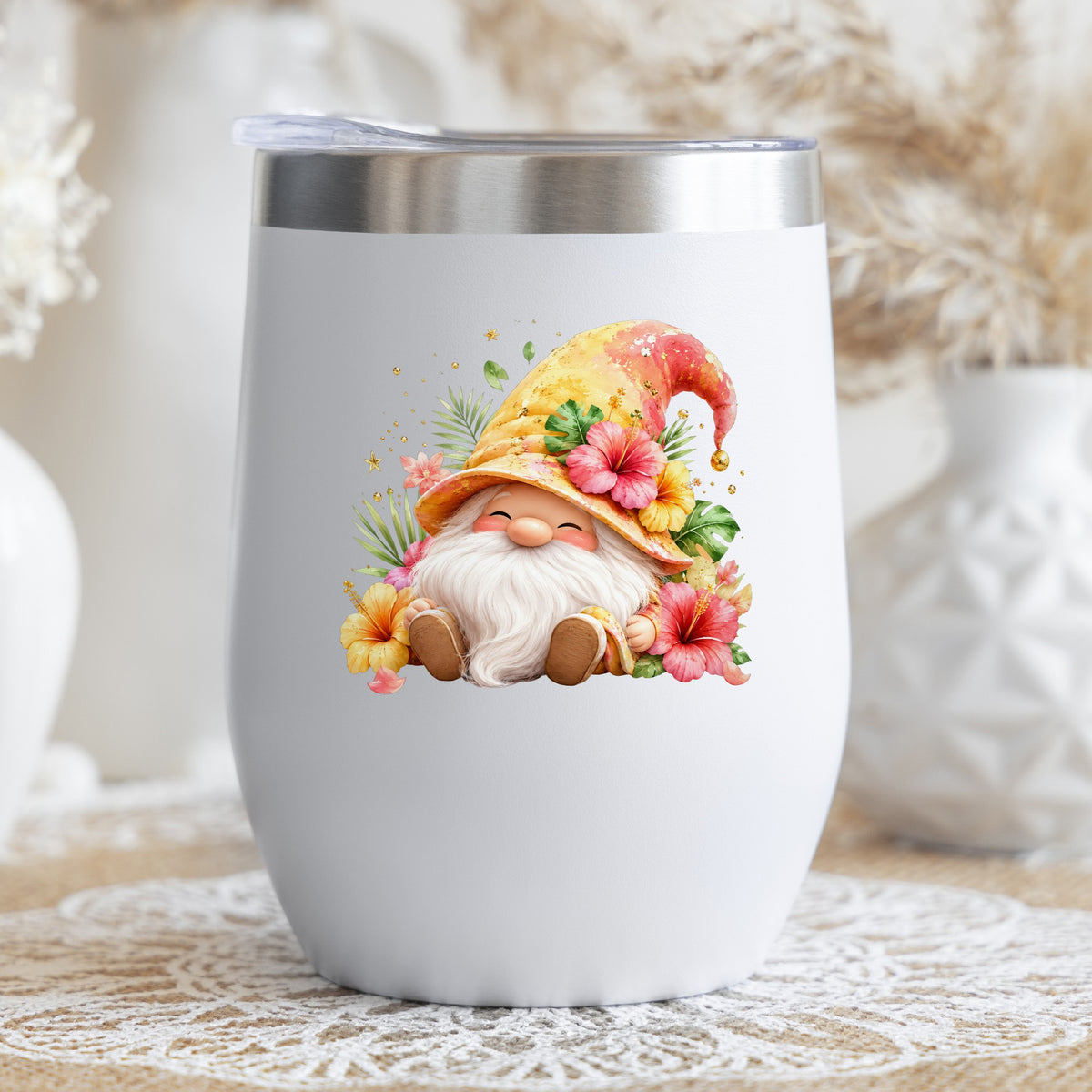 Tropical Hibiscus Gnome UV DTF sticker applied to a white stemless tumbler with a lid
