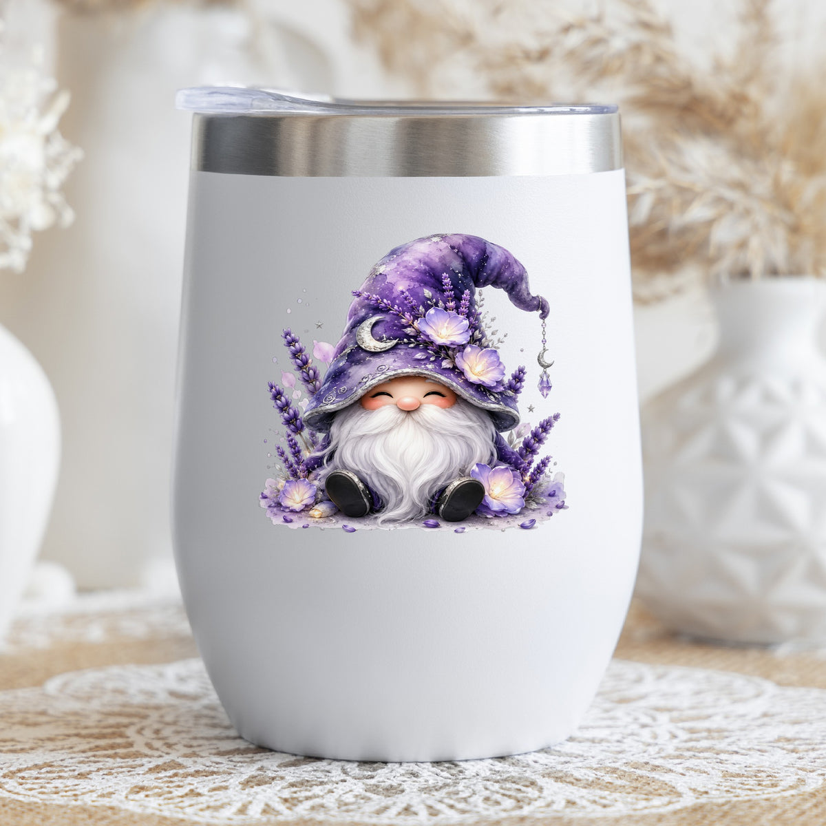 Lavender Gnome With Moon Charm UV DTF sticker applied to a white stemless tumbler with a lid