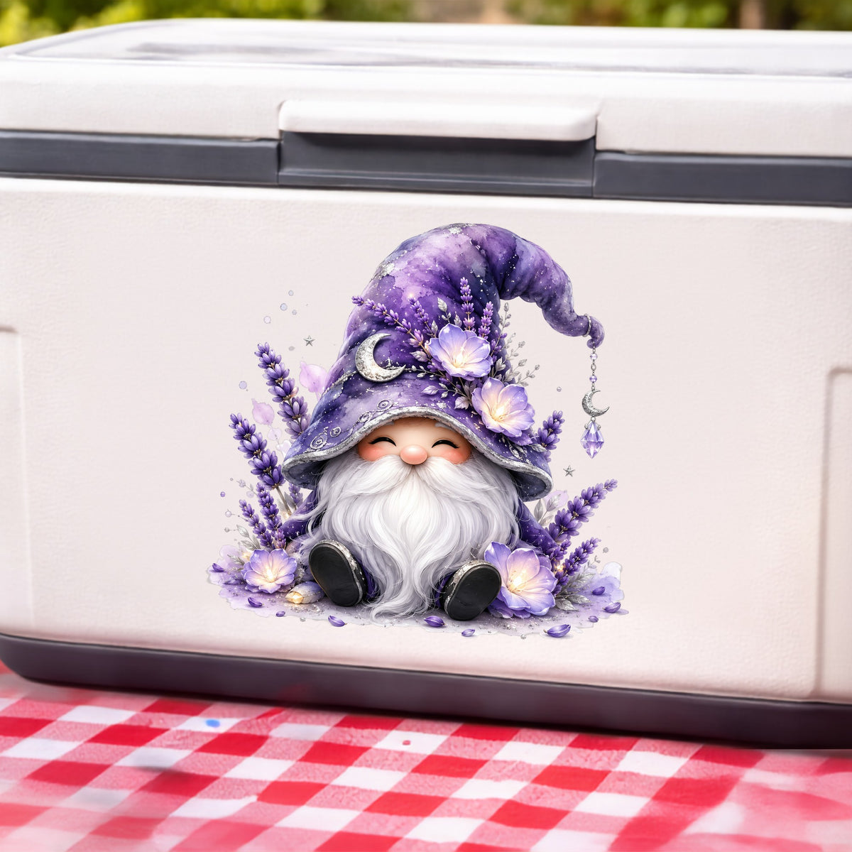 Lavender Gnome With Moon Charm UV DTF sticker applied to a white cooler on a red gingham cloth