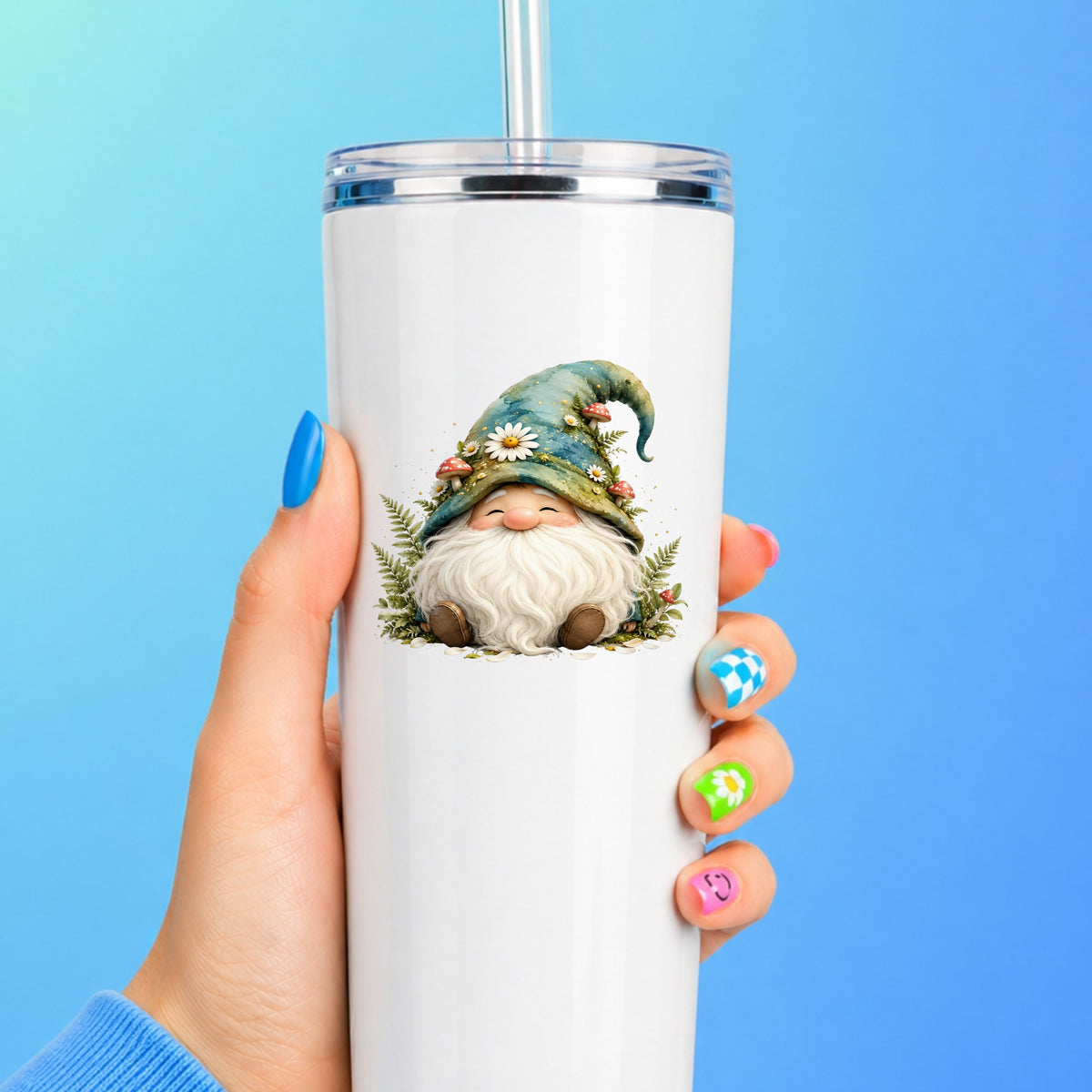 Toadstool Mushroom Gnome UV DTF sticker applied to a white straw tumbler on a blue background