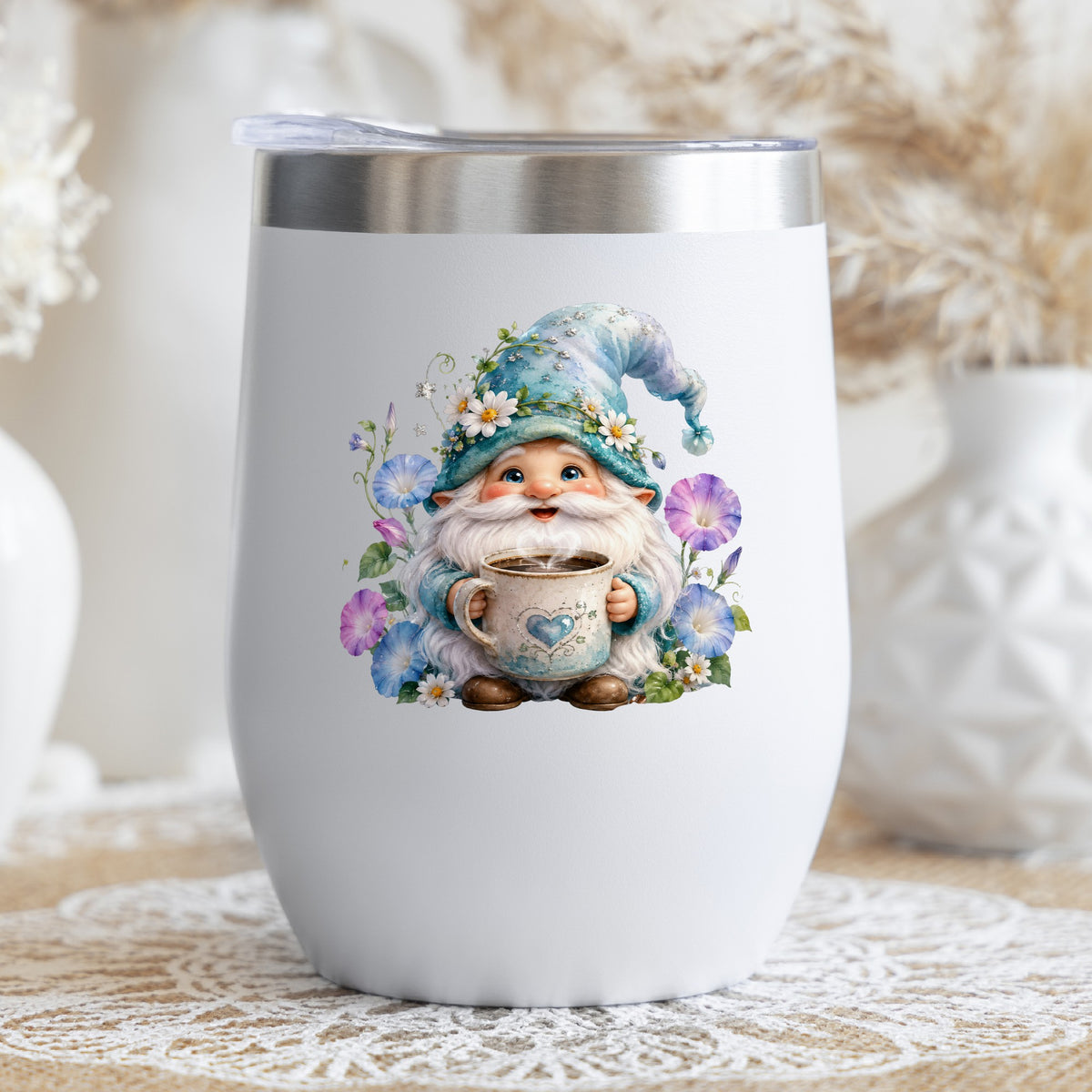 Gnome Holding Coffee Mug UV DTF sticker applied to a white stemless tumbler with a lid