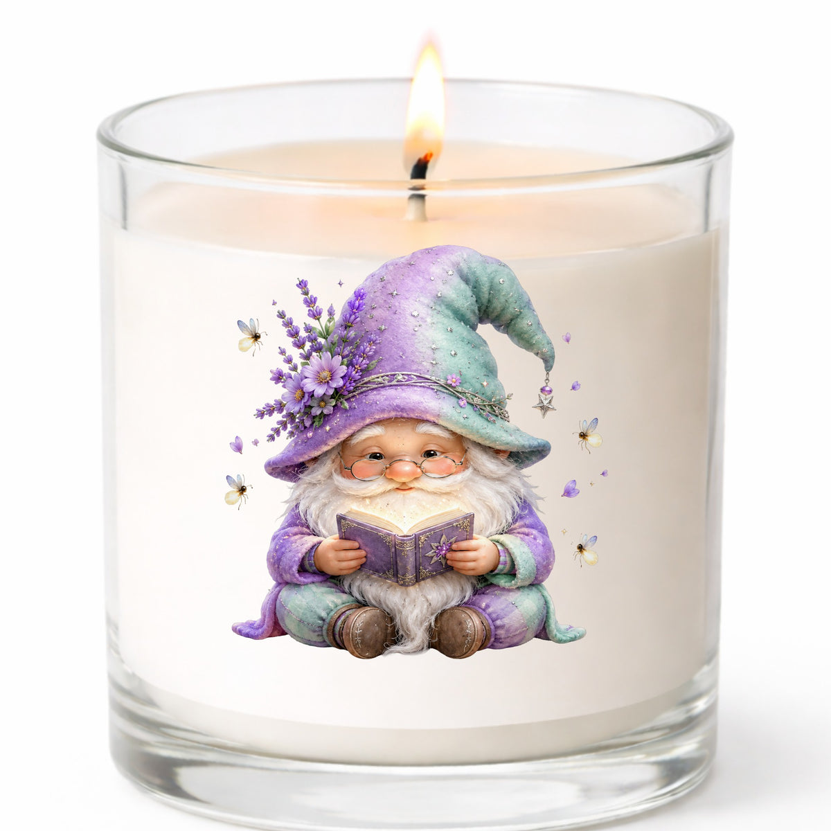 Lavender Reading Gnome With Fireflies UV DTF sticker applied to a white candle in a clear glass jar