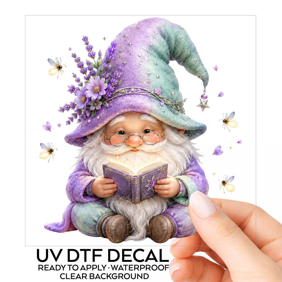 Lavender Reading Gnome With Fireflies UV DTF sticker on its backing card, held in hand