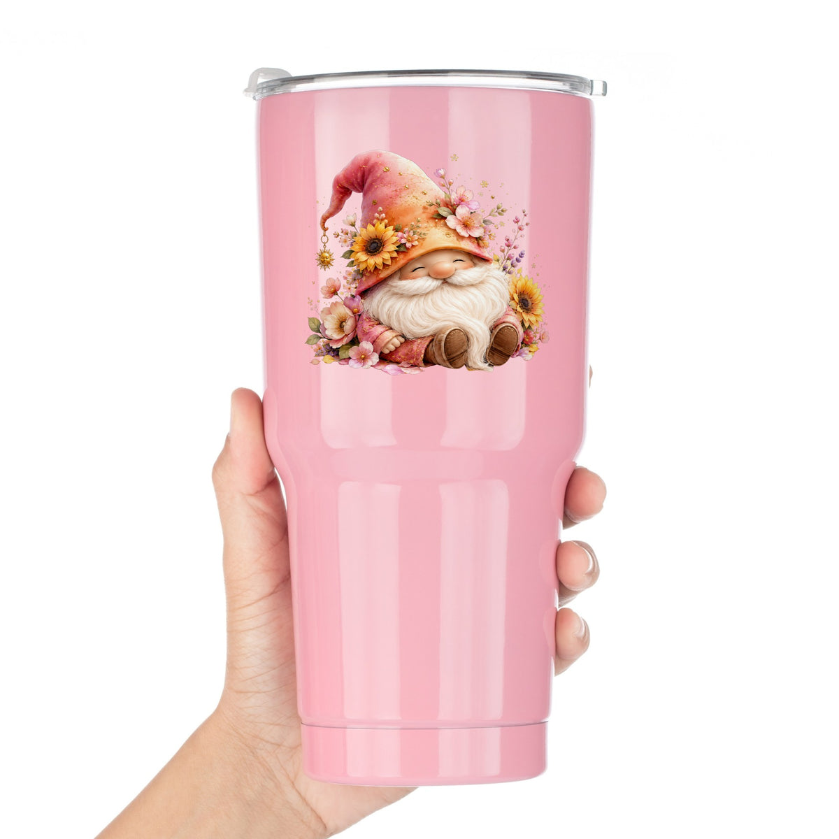 Sunflower Gnome With Pink Flowers UV DTF sticker applied to a pink tumbler held against a white background