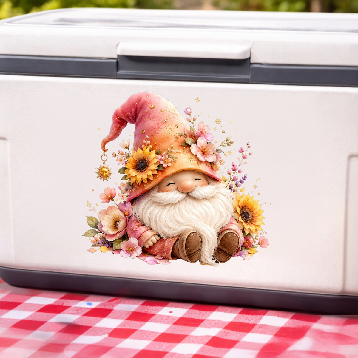 Sunflower Gnome With Pink Flowers UV DTF sticker applied to a white cooler on a red gingham cloth