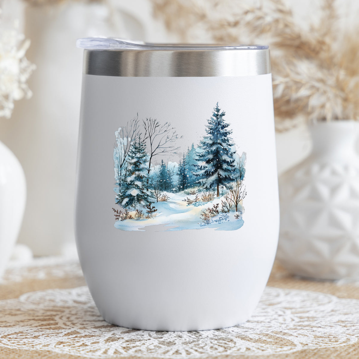 Snowy Pine Forest UV DTF sticker applied to a stemless wine glass